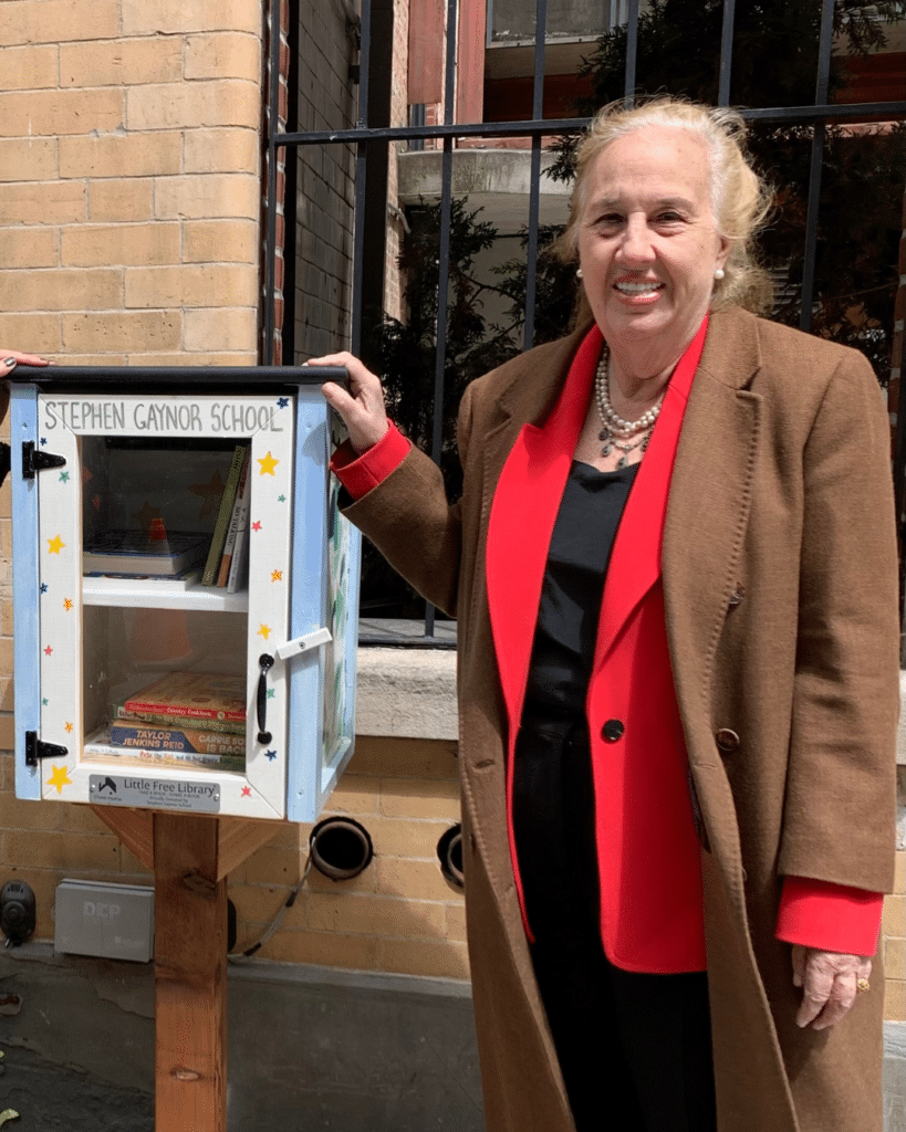New York City Council Member Gale Brewer with the Little Free Library